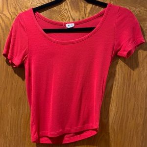A red ribbed short sleeve top from Garage, size XS.